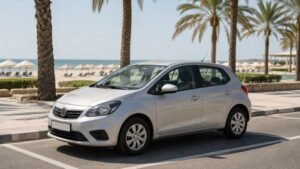 Compact rental car parked near JBR Beach in Dubai Marina